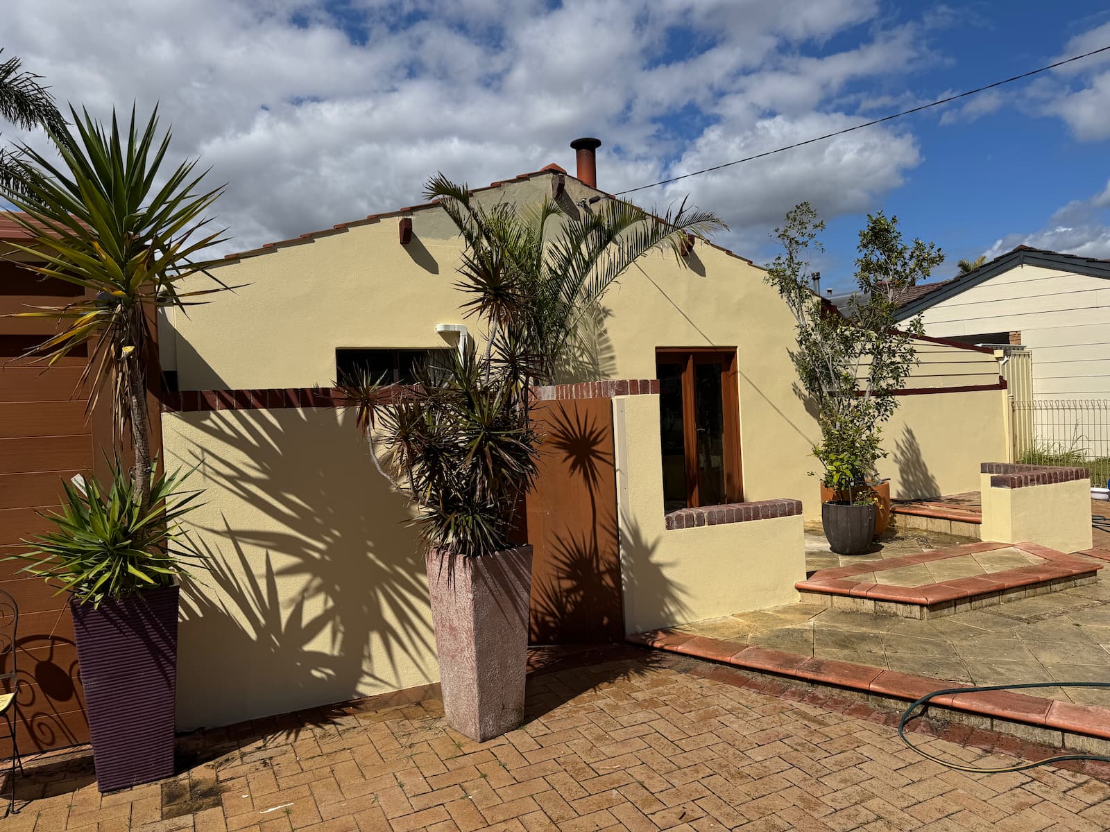 Bibra Lake rear elevation after full re-texture and AcraShield finish in cream